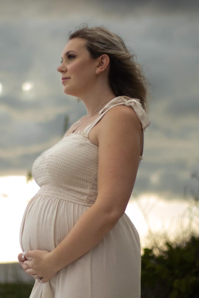 A Pregnant woman posing for the camera2